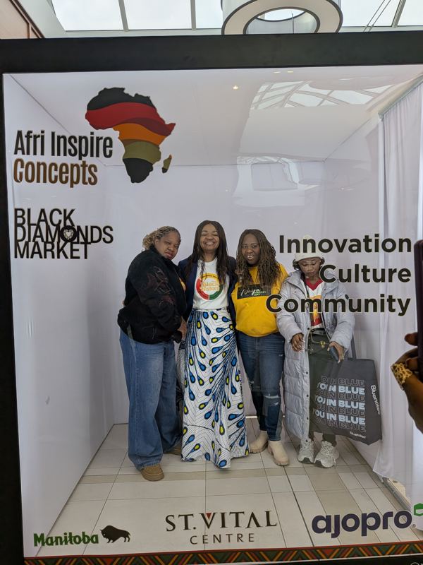 Guests at the Black Diamonds Market photo booth